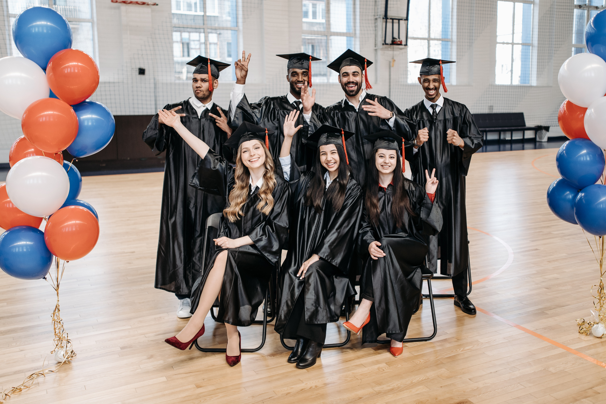 Photo of Fresh Graduates Posing for the Camera