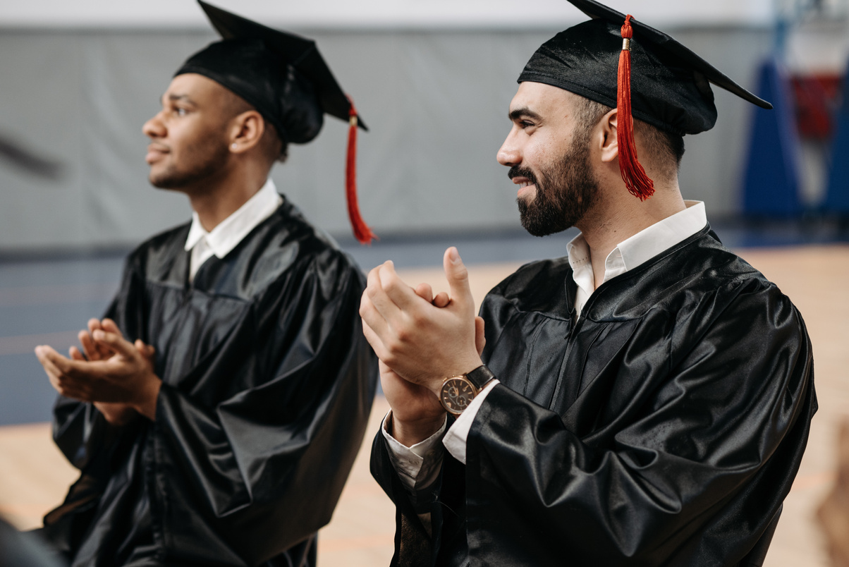 Photo of Men Clapping their Hands